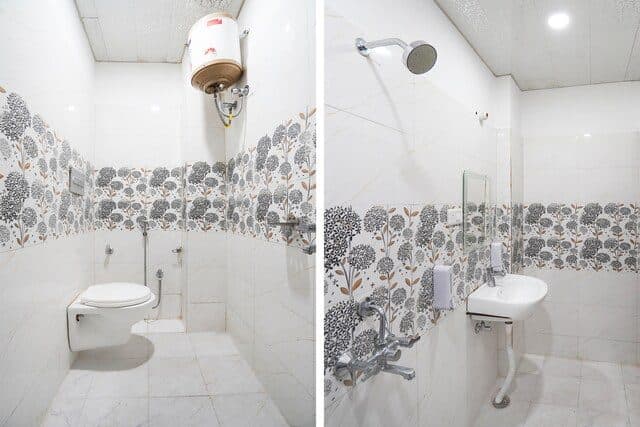 Tiled bathroom with a wall-mounted geyser, western toilet and washbasin