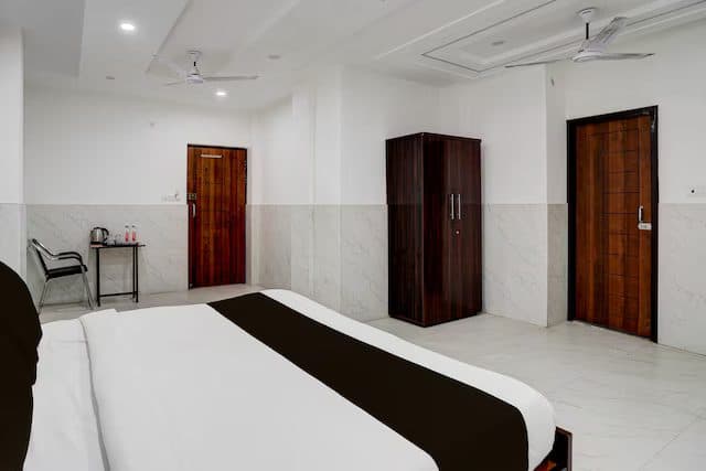 Premium room with a double bed and tiled flooring