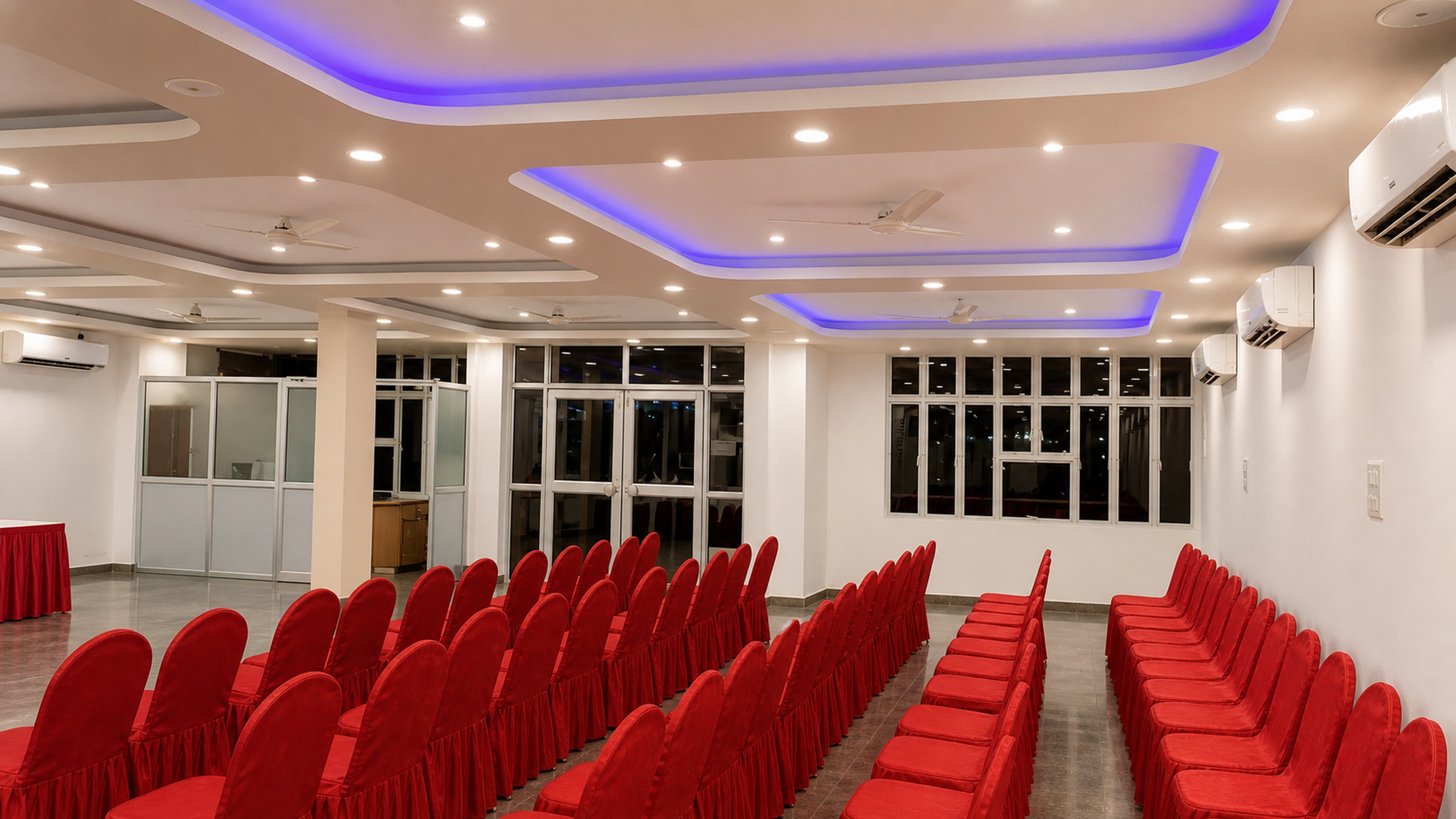 The banquet hall decorated for an evening function