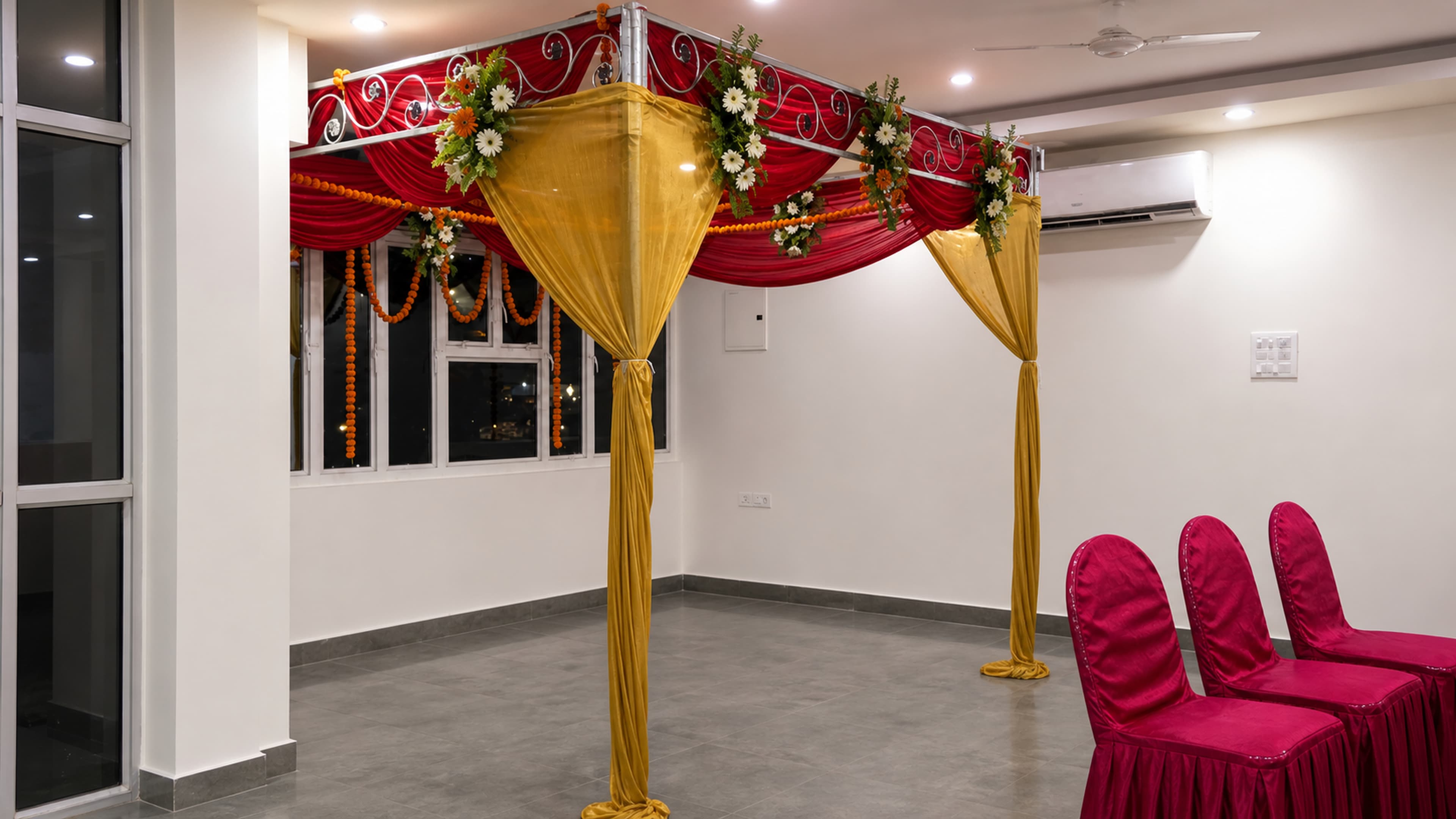 Marigold-draped stage set for a function
